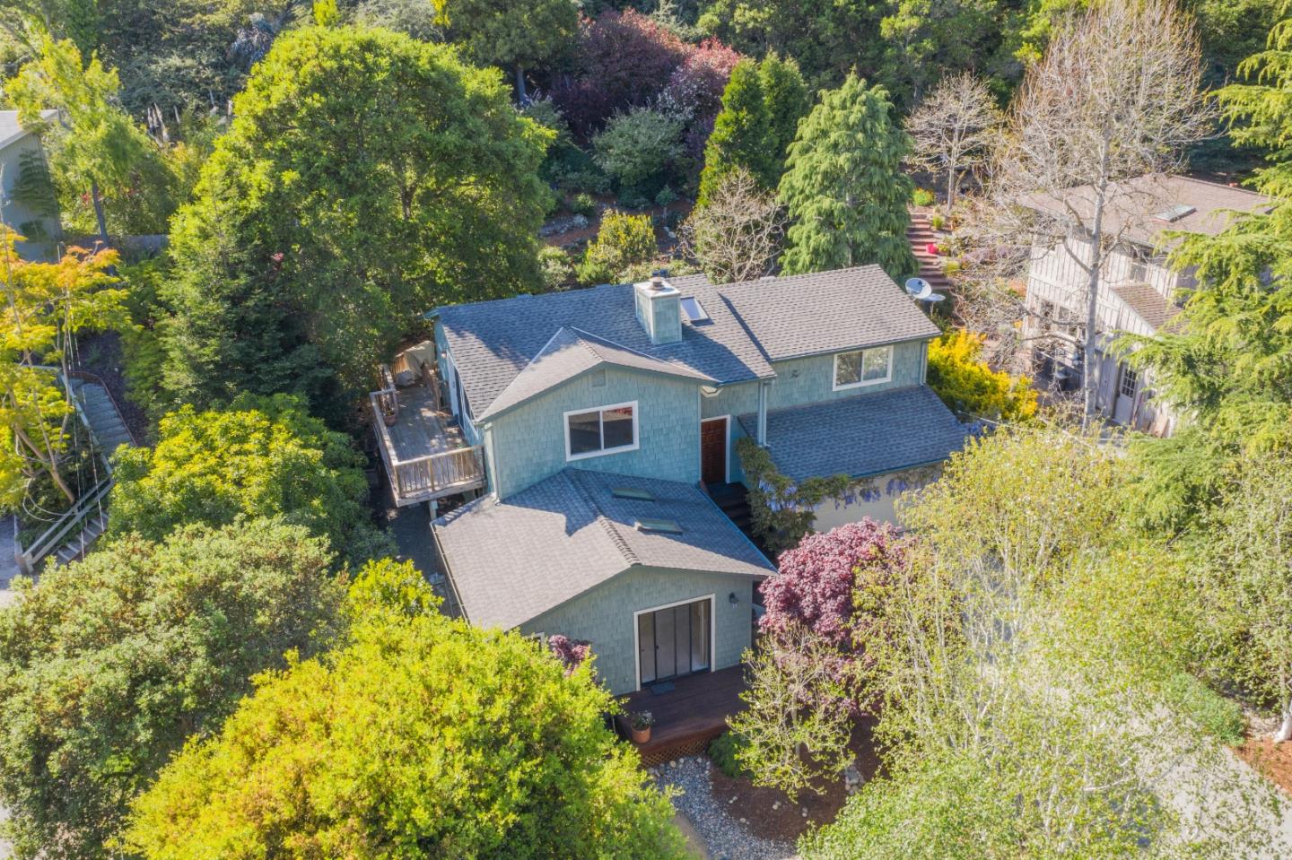 533 La Honda Drive Aptos, CA 95003 - Photo 4 of 44 an aerial view of a house with a yard and garden