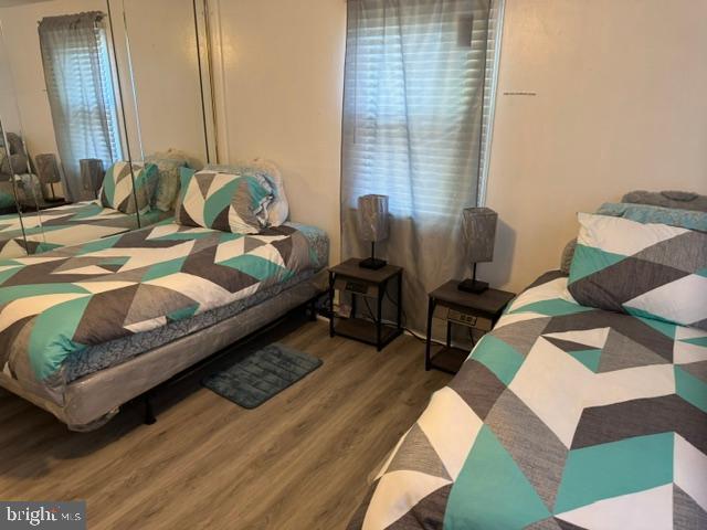4603 Raleigh Road Temple Hills, MD 20748 - Photo 32 of 40 a bedroom with bed and a window