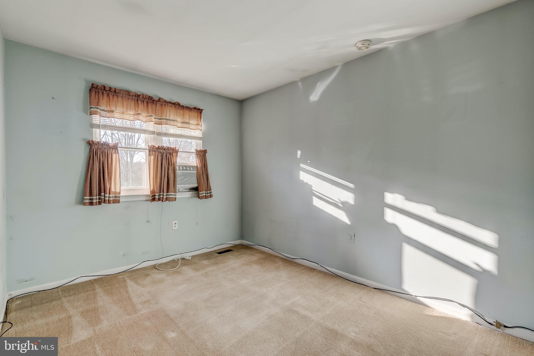 9326 Perglen Road Baltimore, MD 21236 - Photo 35 of 55 a view of empty room with window