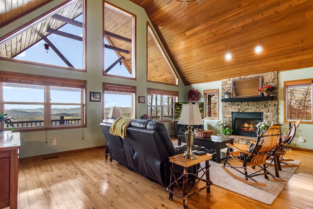 62 Trophy Buck Point Murphy, NC 28906 - Photo 12 of 46 a living room with furniture and a floor to ceiling window