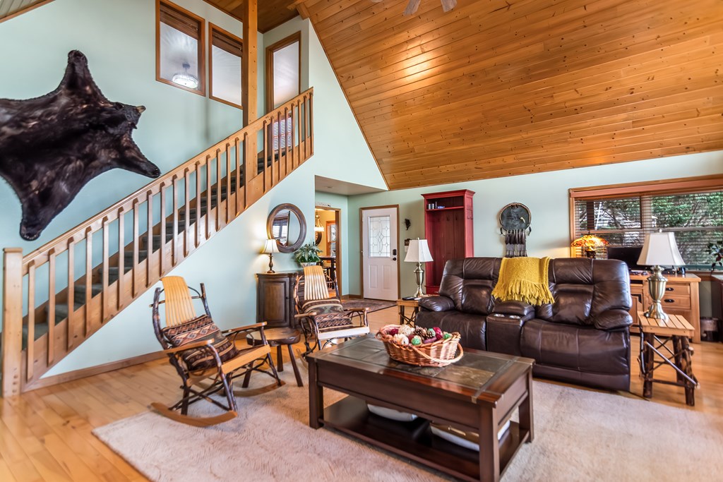 62 Trophy Buck Point Murphy, NC 28906 - Photo 15 of 46 a living room with furniture stairs and a wooden floor