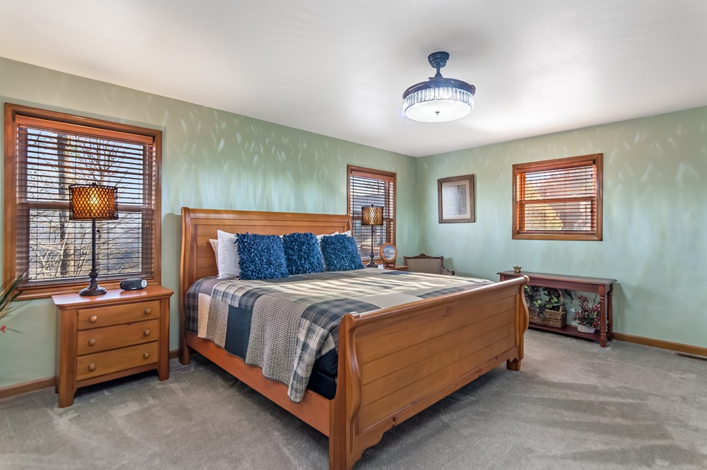62 Trophy Buck Point Murphy, NC 28906 - Photo 18 of 46 a spacious bedroom with a bed and a window