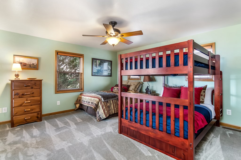 62 Trophy Buck Point Murphy, NC 28906 - Photo 23 of 46 a bedroom with a bed and a baby crib