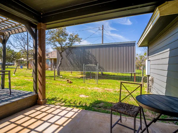 a view of a swimming pool with a lounge chairs