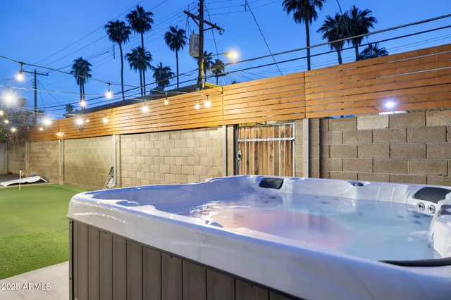 a backyard of a house with seating space