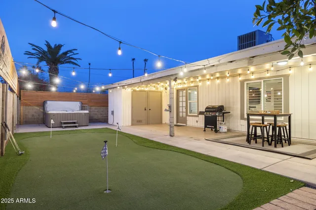 a view of a swimming pool with chairs