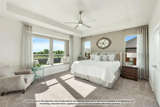 a bedroom with a large bed and a large window