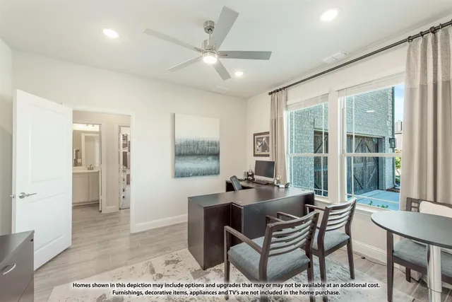 a dining room with furniture and a floor to ceiling window