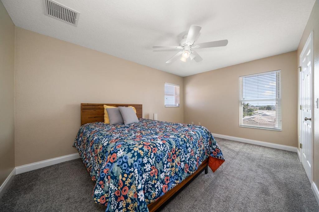 3339 Seaway Drive New Port Richey, FL 34652 - Photo 36 of 48 a bedroom with a bed and window