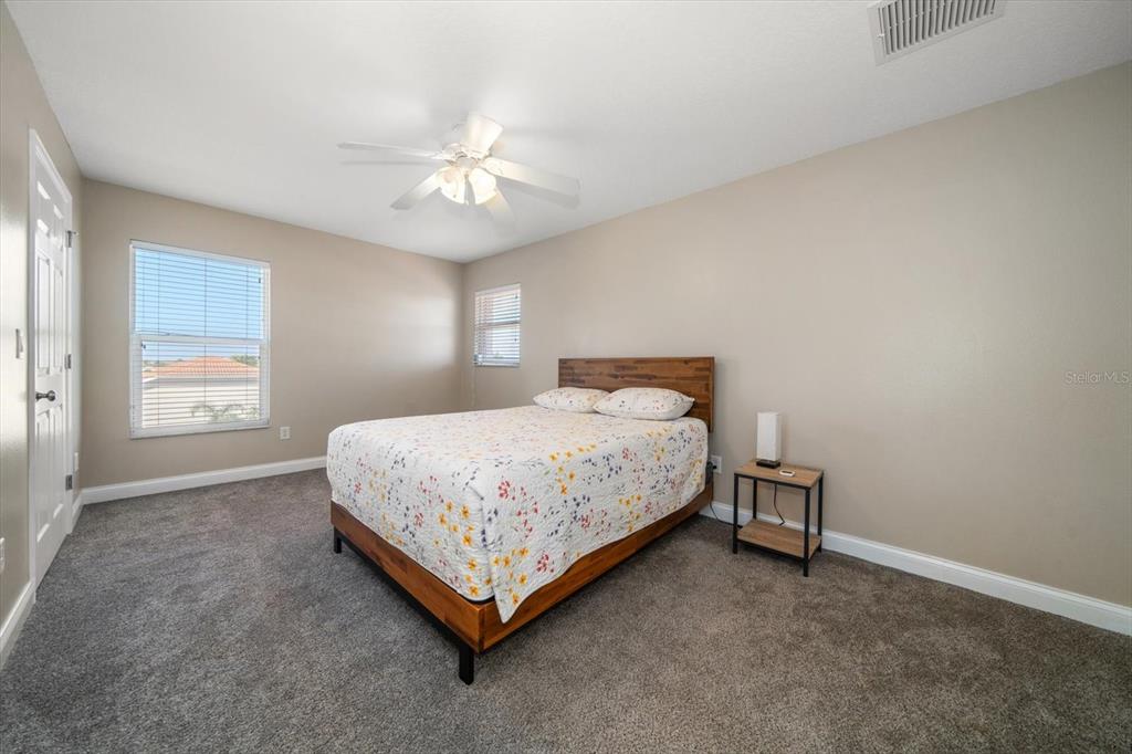 3339 Seaway Drive New Port Richey, FL 34652 - Photo 38 of 48 a bedroom with a bed and a window