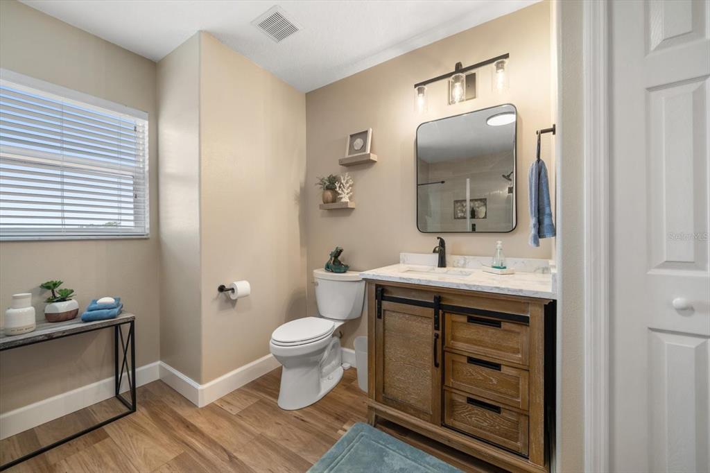 3339 Seaway Drive New Port Richey, FL 34652 - Photo 41 of 48 a spacious bathroom with a sink toilet and mirror