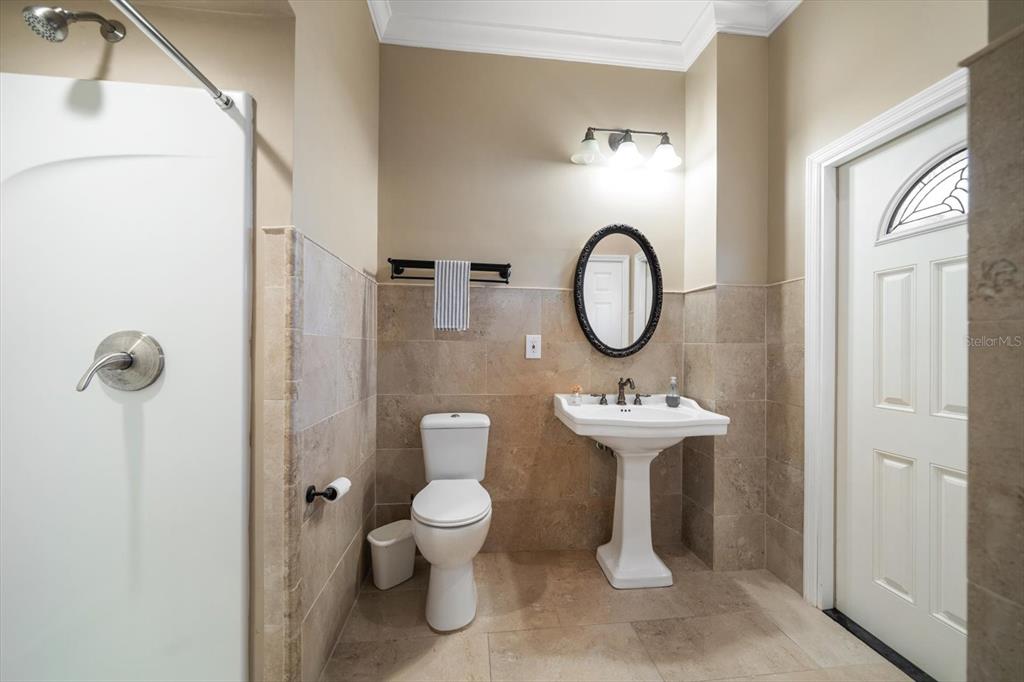 3339 Seaway Drive New Port Richey, FL 34652 - Photo 44 of 48 a bathroom with a sink a toilet and a mirror