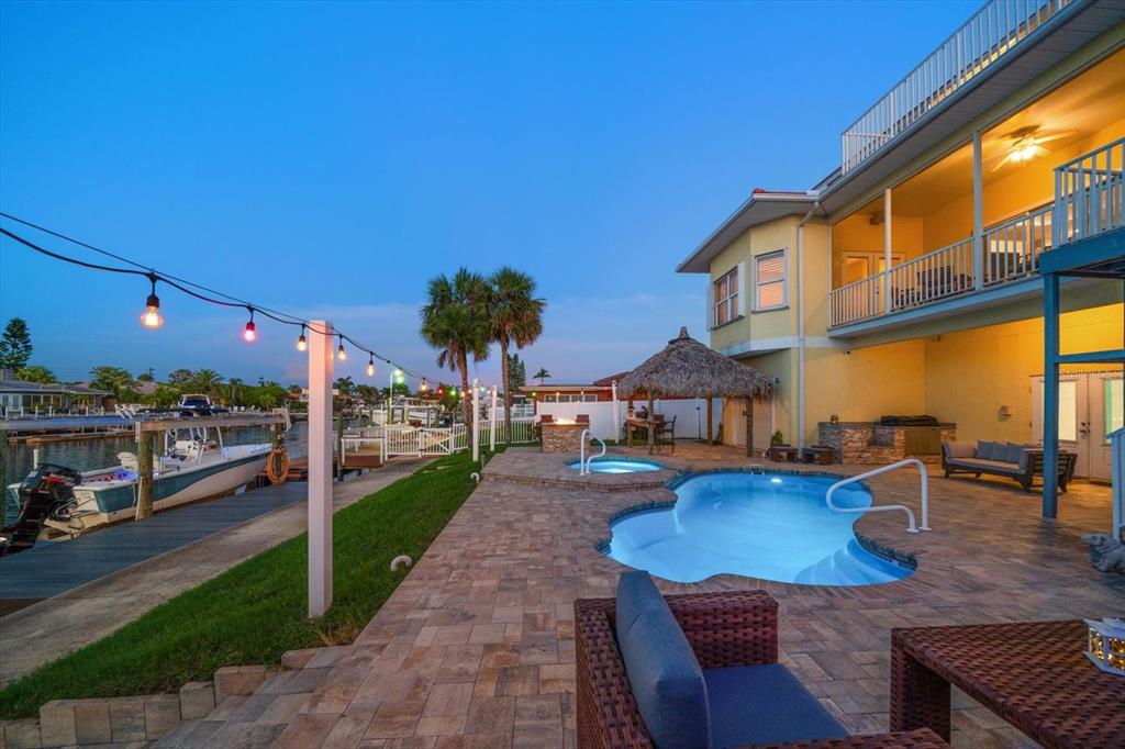 3339 Seaway Drive New Port Richey, FL 34652 - Photo 8 of 48 a view of a house with a patio