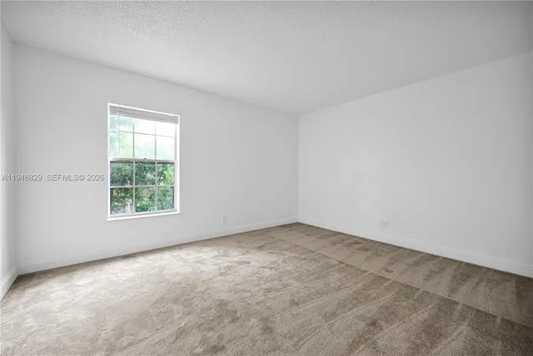 an empty room with a window