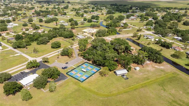 a bed with a bed and a black and white comforter