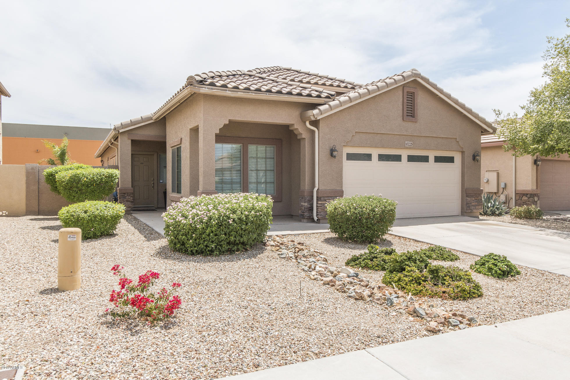 10225 West Chipman Road Tolleson, AZ 85353 - Photo 1 of 20 1) FRONT OF HOME