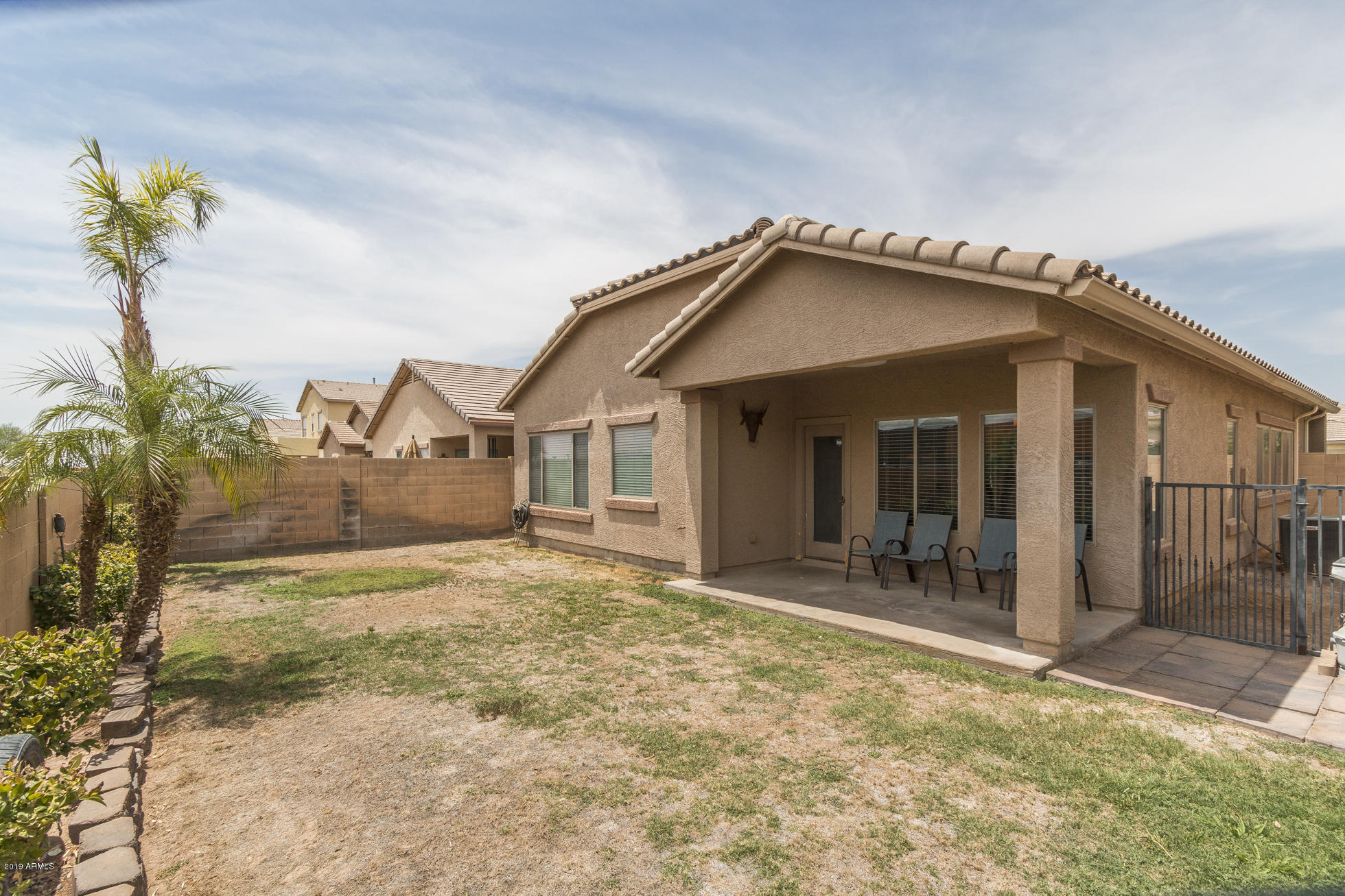10225 West Chipman Road Tolleson, AZ 85353 - Photo 19 of 20 20) BACK OF HOME