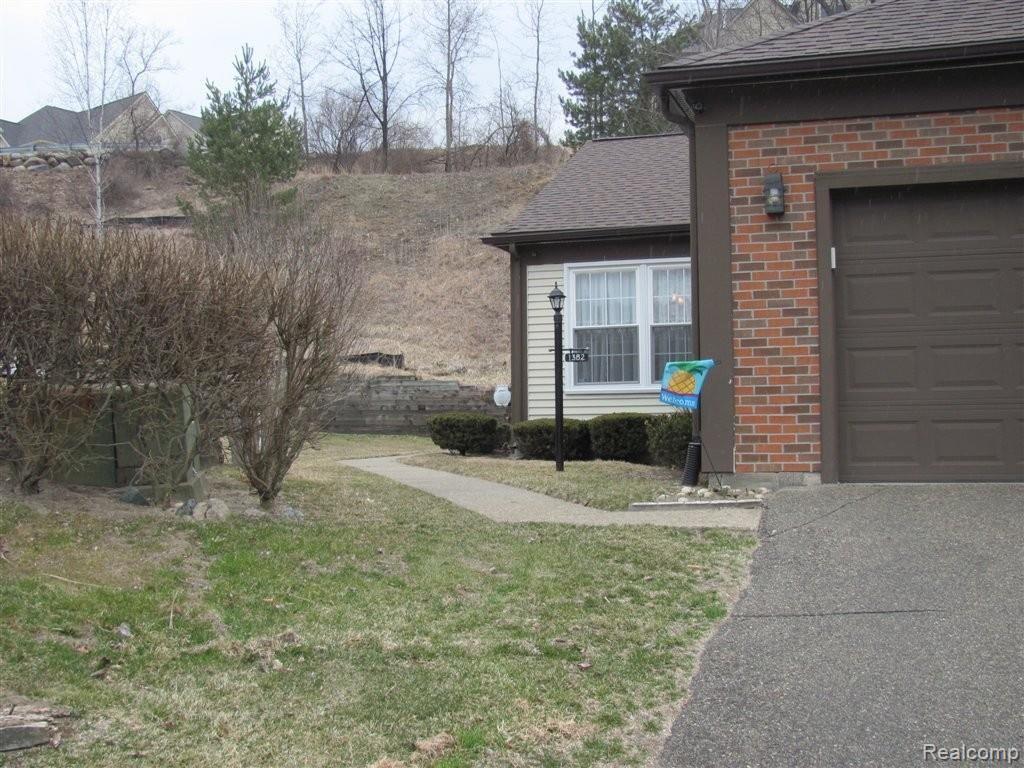 1382 Crescent Lane Rochester, MI 48306 - Photo 23 of 24 View Of Condo from Driveway