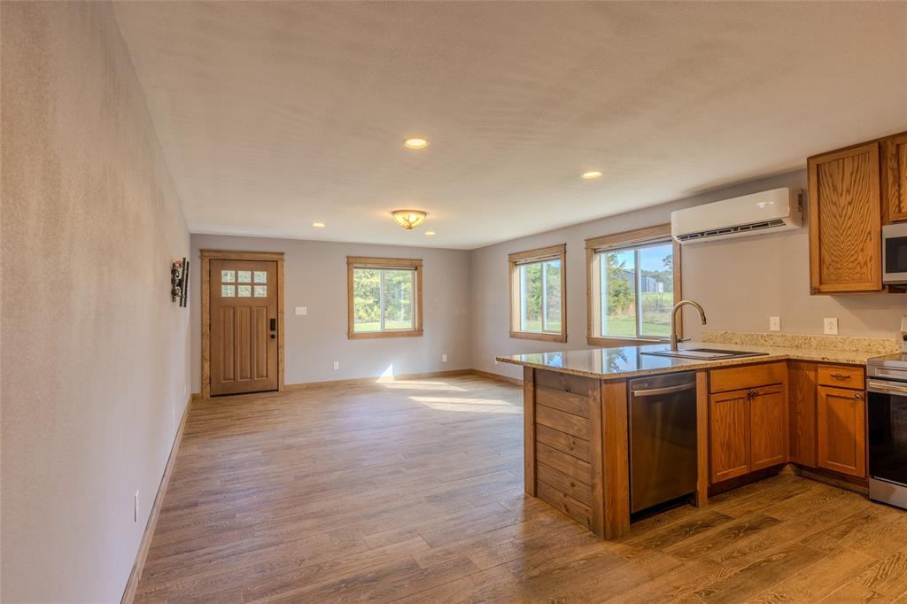 984 County Rd SE 4350 Scroggins, TX 75480 - Photo 12 of 35 a view of a kitchen counter top space and windows