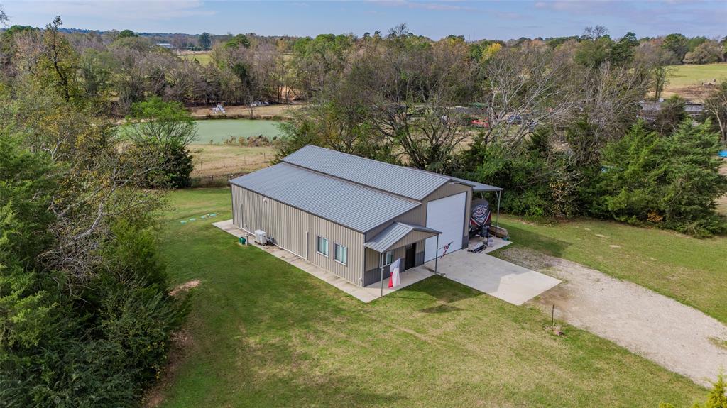 984 County Rd SE 4350 Scroggins, TX 75480 - Photo 33 of 35 an aerial view of a house