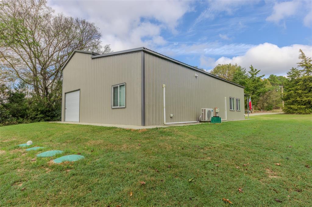 984 County Rd SE 4350 Scroggins, TX 75480 - Photo 5 of 35 a view of a backyard of the house