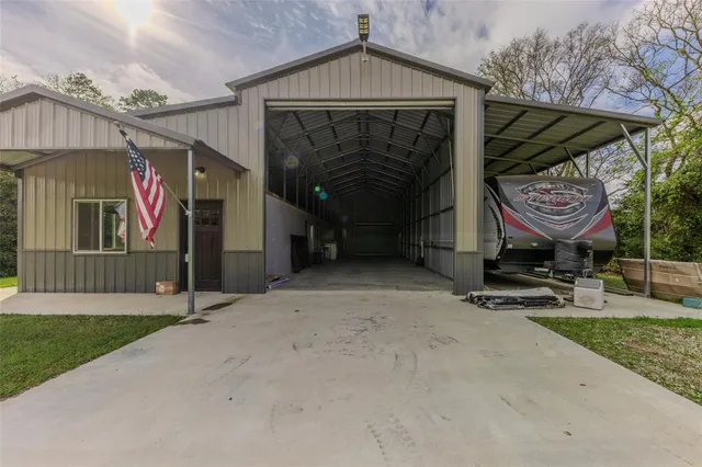 a view of a car park in front of house