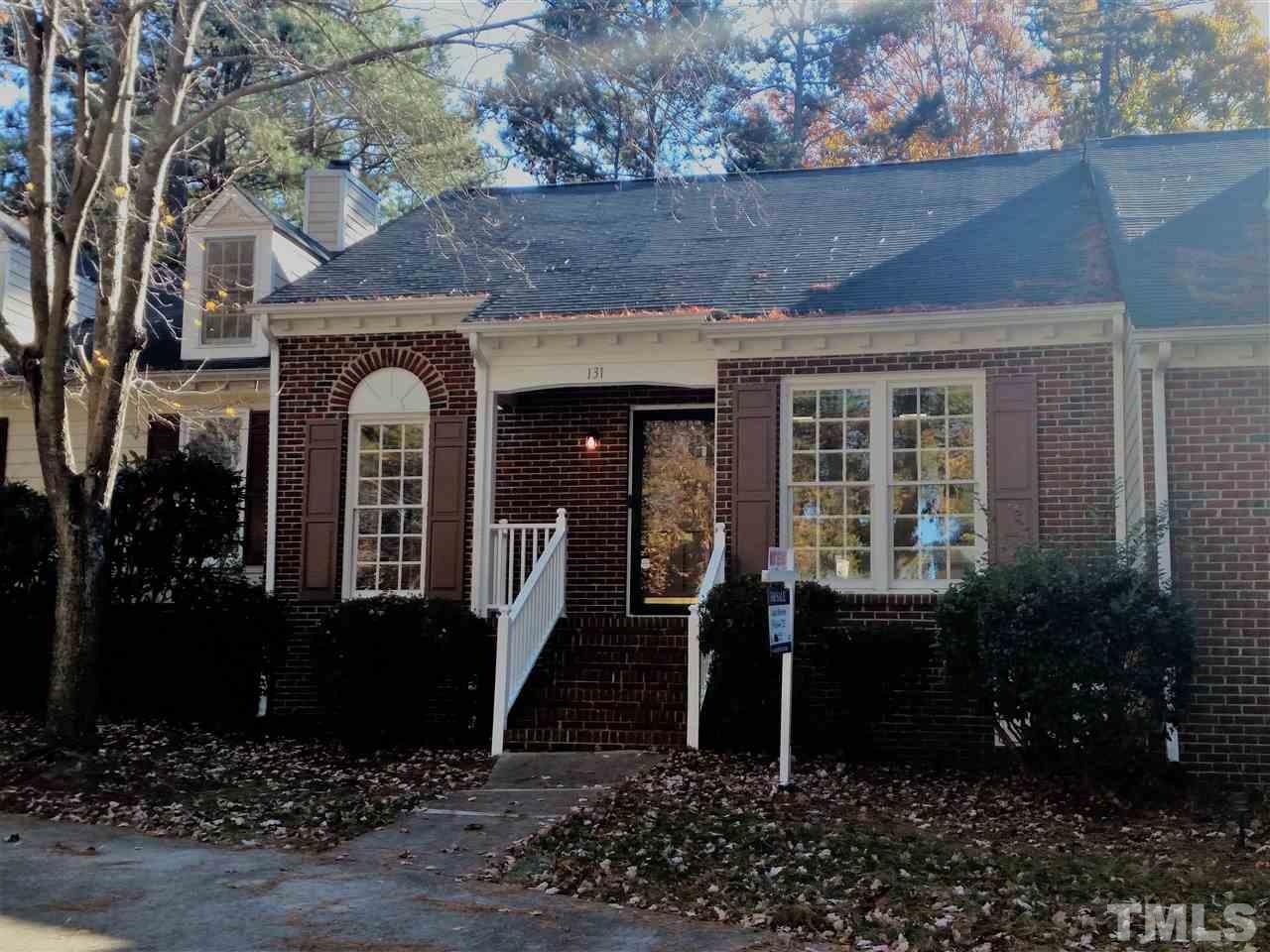 131 Renwick Court Raleigh, NC 27615 - Photo 1 of 21 a front view of a house with garden