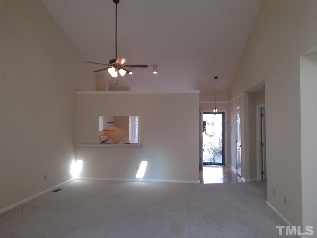 131 Renwick Court Raleigh, NC 27615 - Photo 11 of 21 a view of a livingroom with a chandelier fan