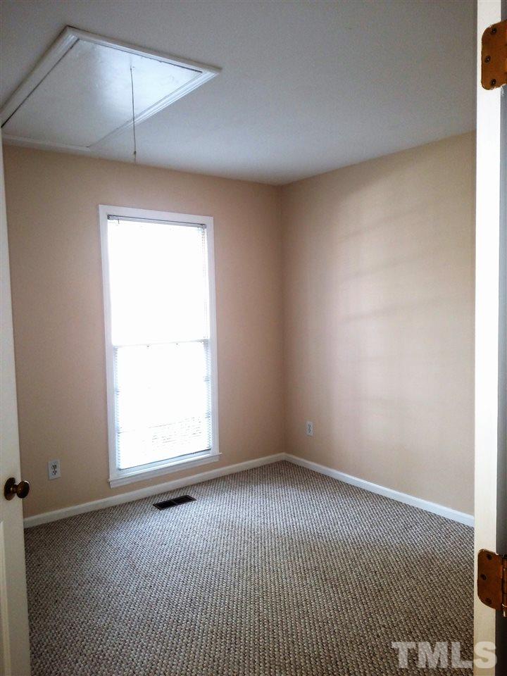 131 Renwick Court Raleigh, NC 27615 - Photo 15 of 21 an empty room with a window