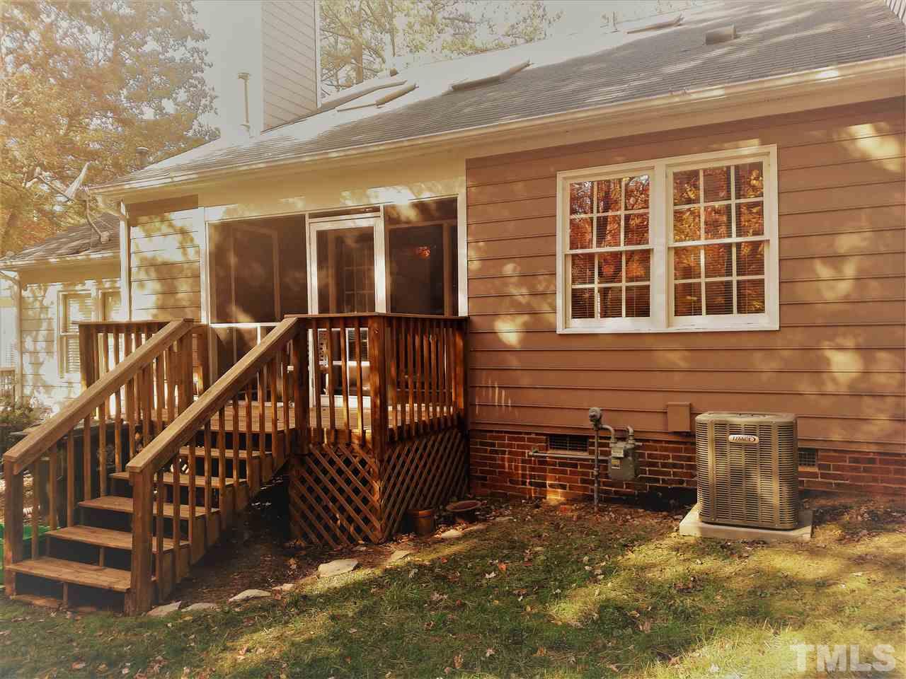 131 Renwick Court Raleigh, NC 27615 - Photo 21 of 21 a view of a house with wooden fence