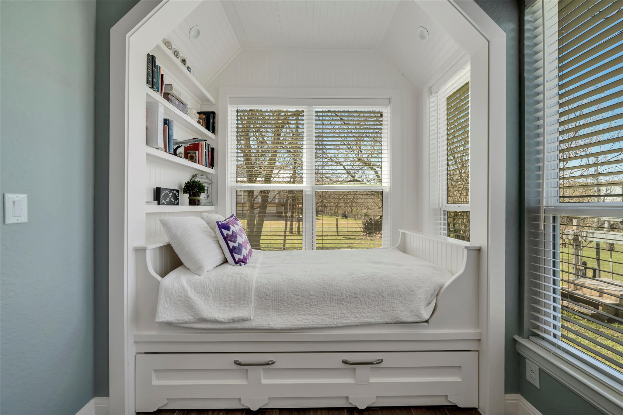 204 West Blanco Bend Drive Wimberley, TX 78676 - Photo 18 of 34 a bedroom with a bed and a window