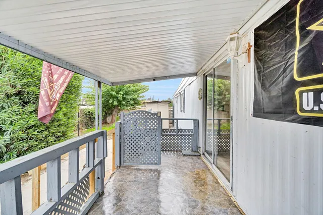 a view of a porch with furniture