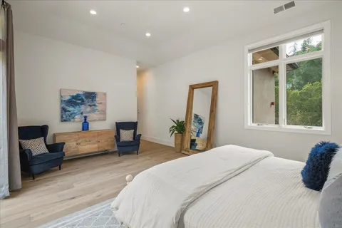 a bathroom with a shower and a toilet