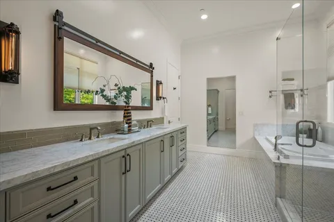 a bedroom with two beds and a couch