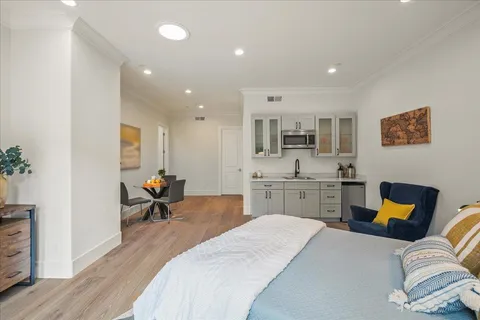 a view of a street with a building in the background