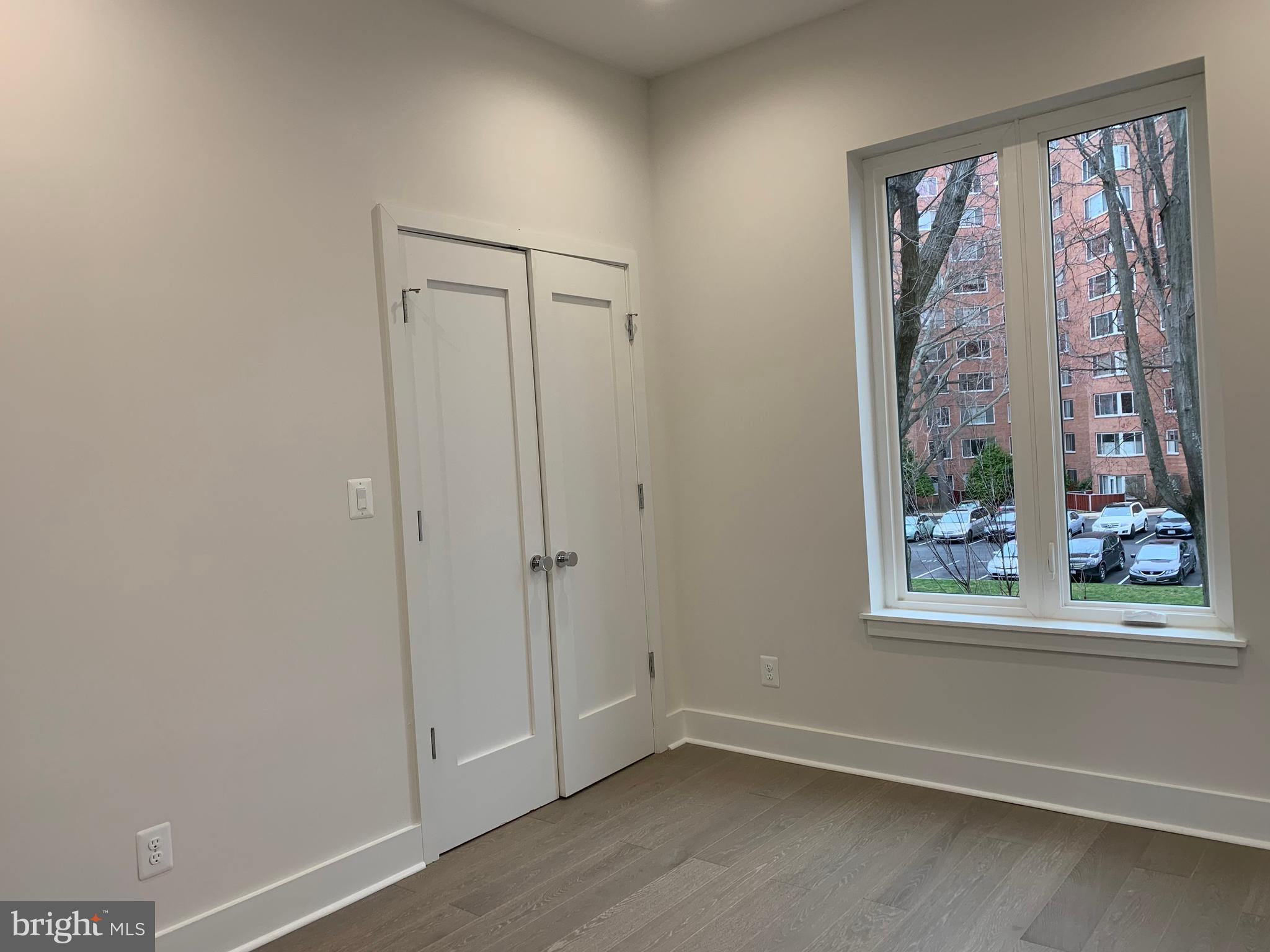 4008 Edmunds Street Northwest, Unit 6 Washington, DC 20007 - Photo 10 of 31 a view of an empty room with a window