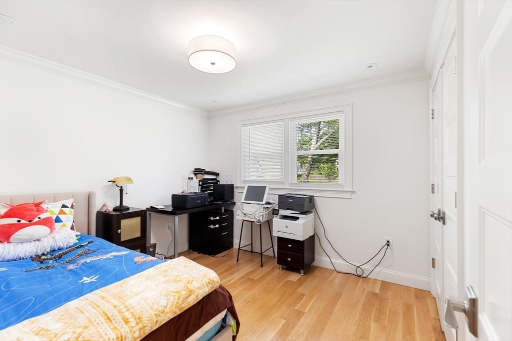 155 Adams Avenue Newton, MA 02465 - Photo 19 of 37 a bed room with a bed and a window