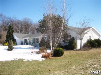 2533 Beacon Road Bath, PA 18014 - Photo 1 of 11 a view of a yard with a large tree
