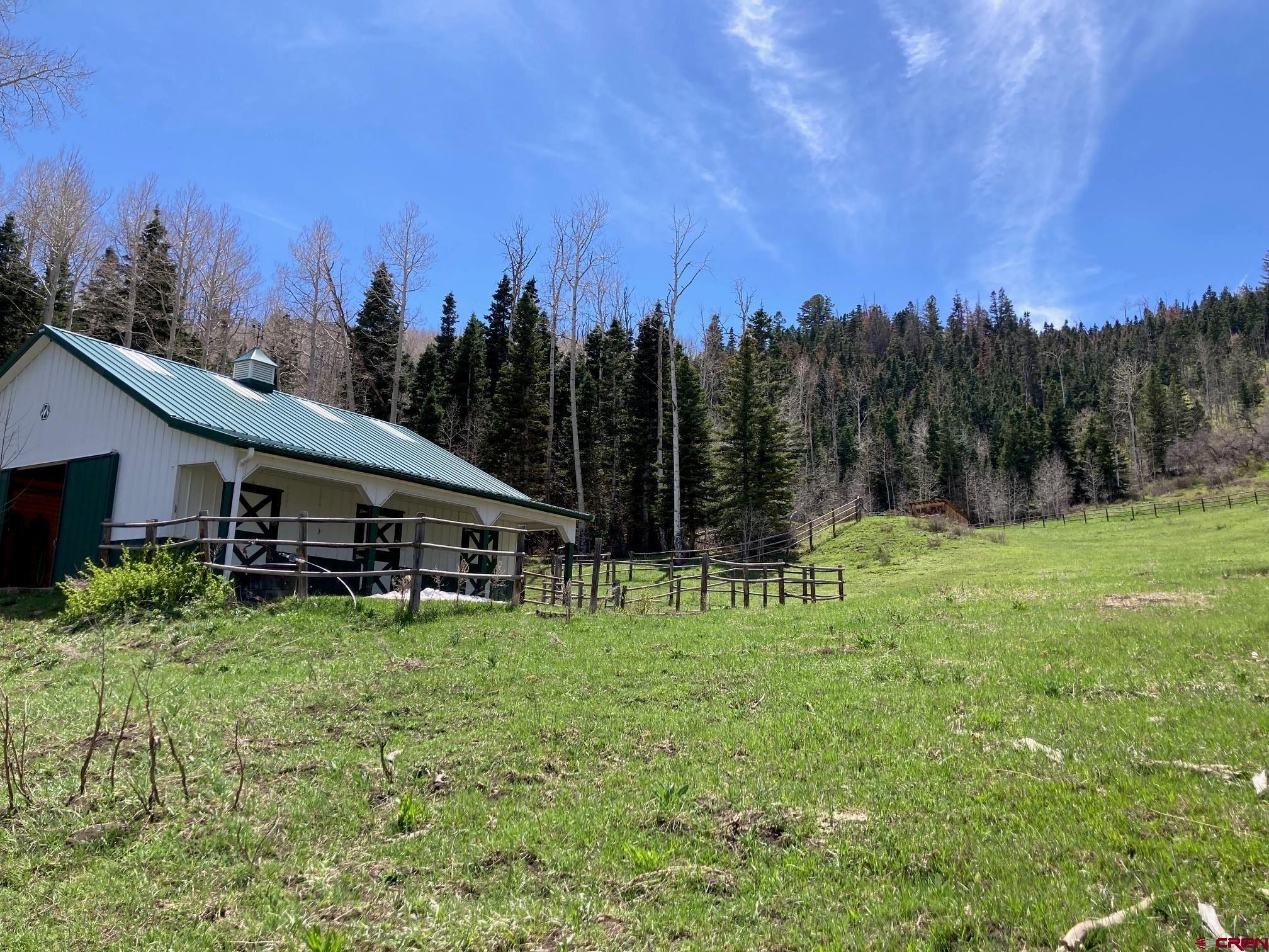 361 Golden Ridge Drive Ridgway, CO 81432 - Photo 14 of 25 a view of a house with a yard and sitting area