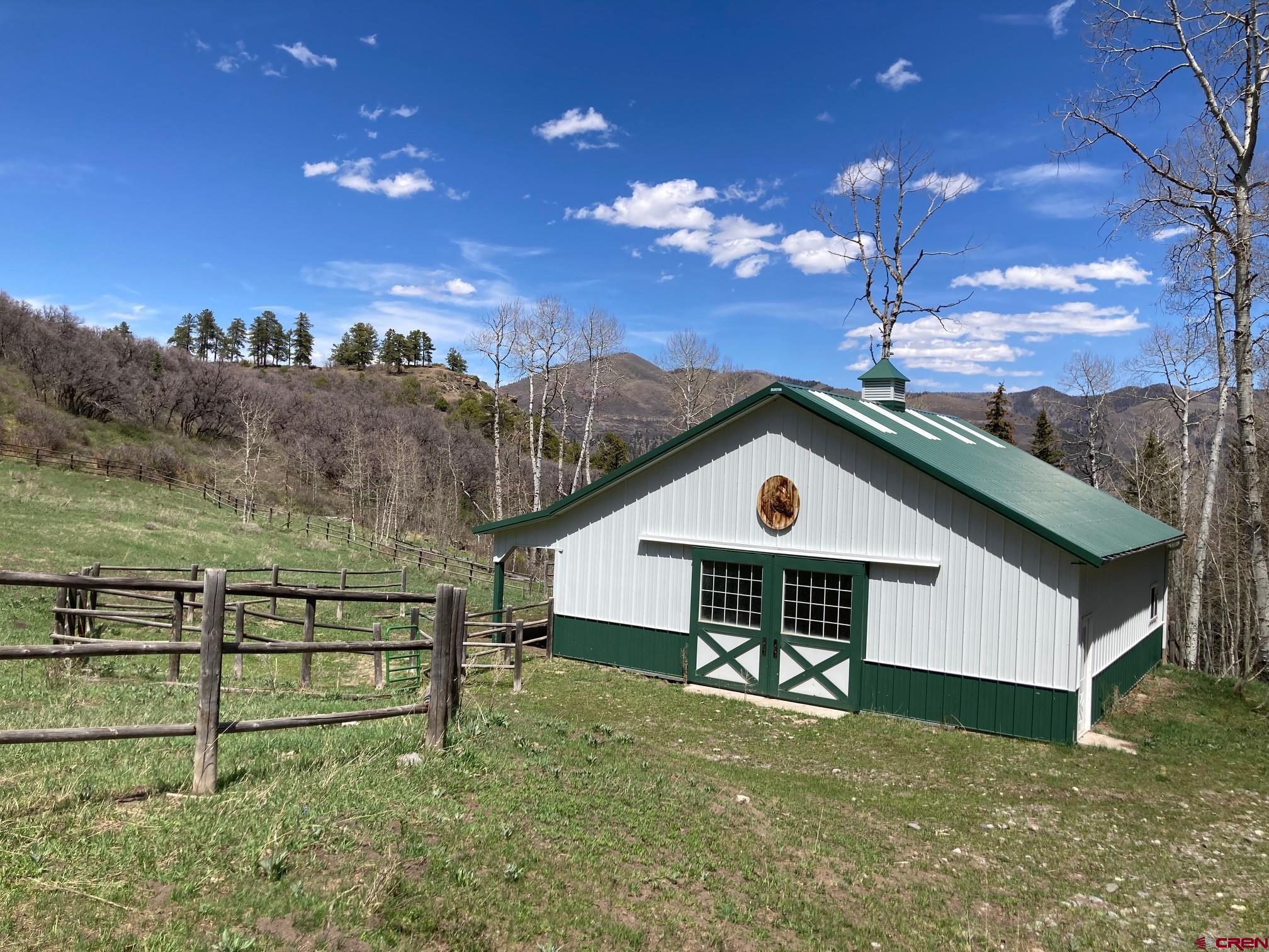 361 Golden Ridge Drive Ridgway, CO 81432 - Photo 8 of 25 a front view of a house with a yard