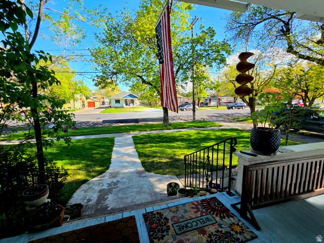 142 West 400 North Logan, UT 84321 - Photo 5 of 35 Covered front porch with painted wood flooring