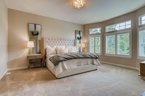 a view of a house with a yard porch and sitting area