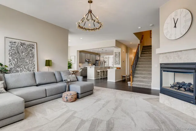 a spacious bedroom with a bed and a large window