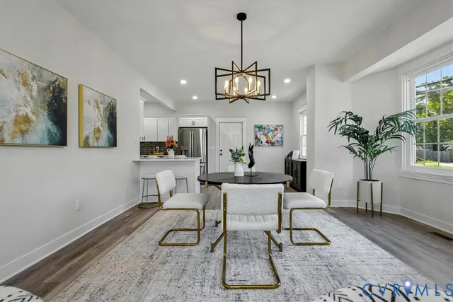 a view of a dining room with furniture