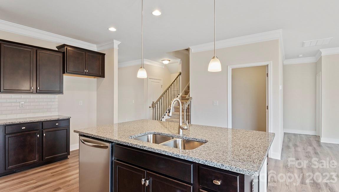 245 Fox Cove Road Hendersonville, NC 28792 - Photo 12 of 33 a kitchen with a sink and refrigerator