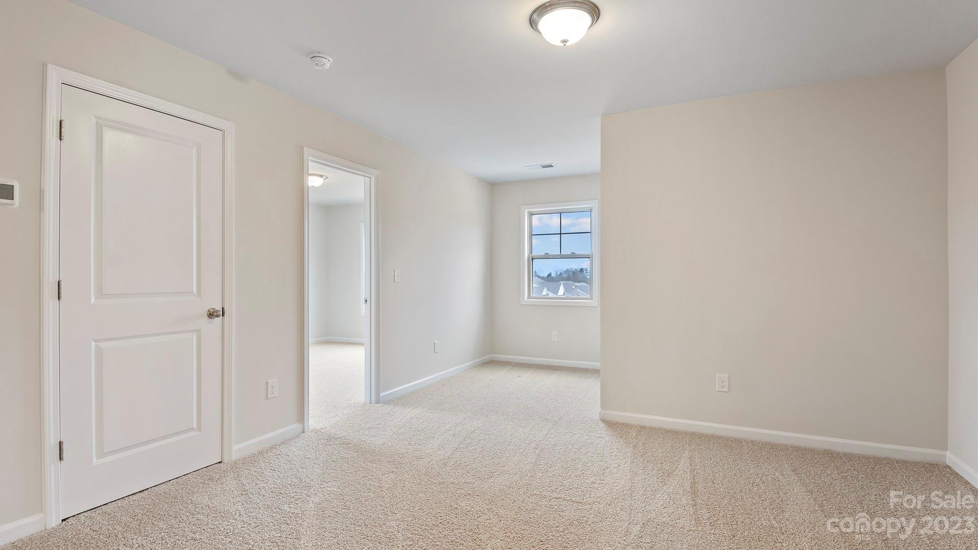 245 Fox Cove Road Hendersonville, NC 28792 - Photo 21 of 33 an empty room with windows