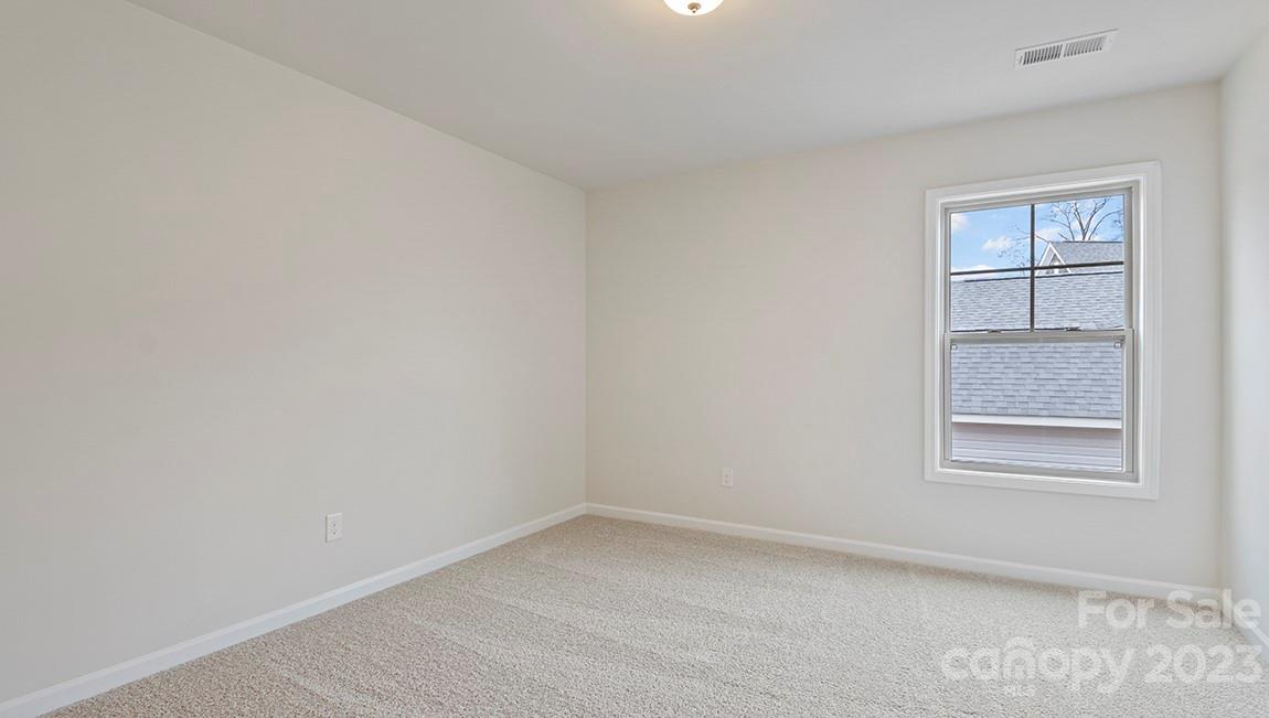 245 Fox Cove Road Hendersonville, NC 28792 - Photo 23 of 33 an empty room with a window