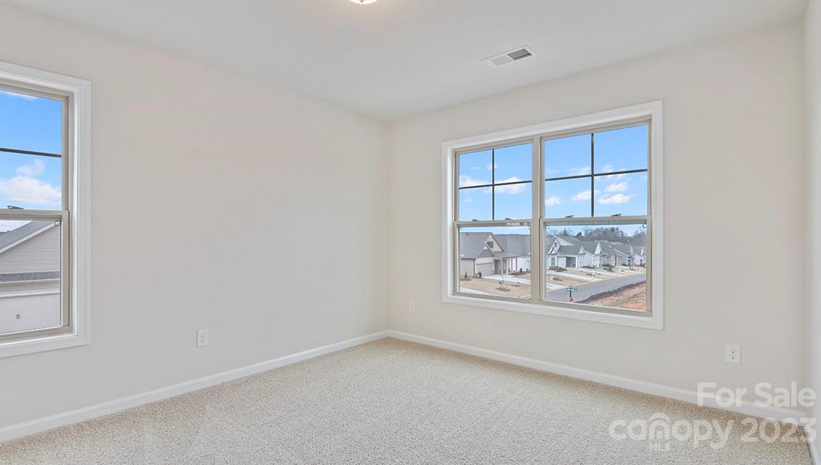 245 Fox Cove Road Hendersonville, NC 28792 - Photo 25 of 33 an empty room with windows