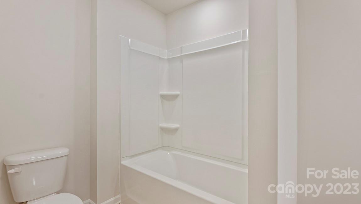 245 Fox Cove Road Hendersonville, NC 28792 - Photo 30 of 33 a white bath tub sitting next to a toilet