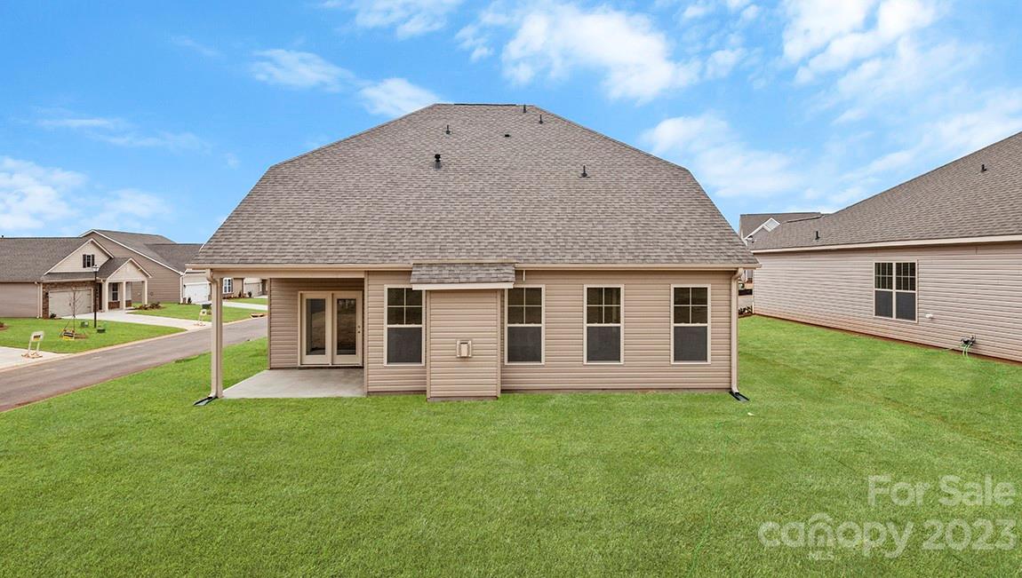 245 Fox Cove Road Hendersonville, NC 28792 - Photo 32 of 33 a view of a house with a yard and sitting area